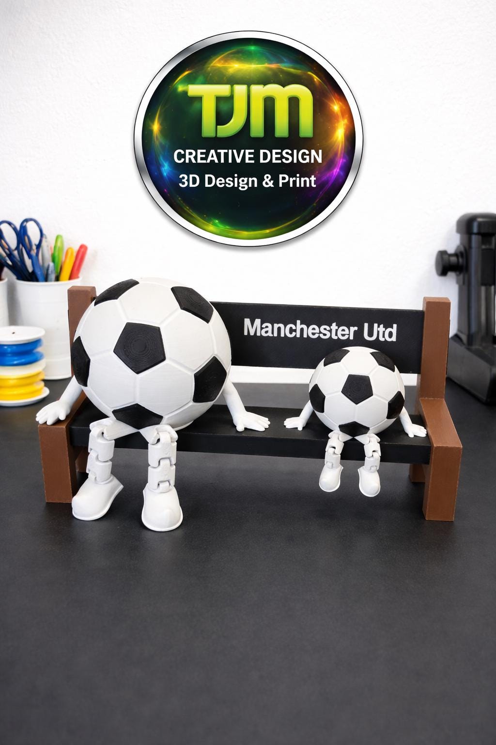Parent and child football bench figurine